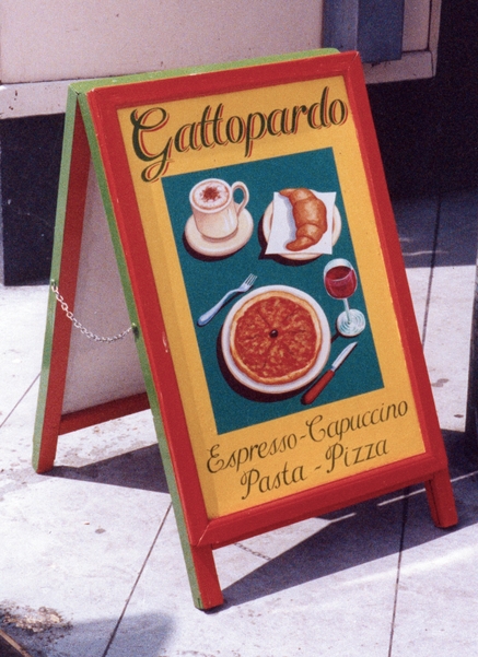 ‘Gattopardo’ Sicilian restaurant, Kings Cross, London.  Painted sandwich board
sign  1994.